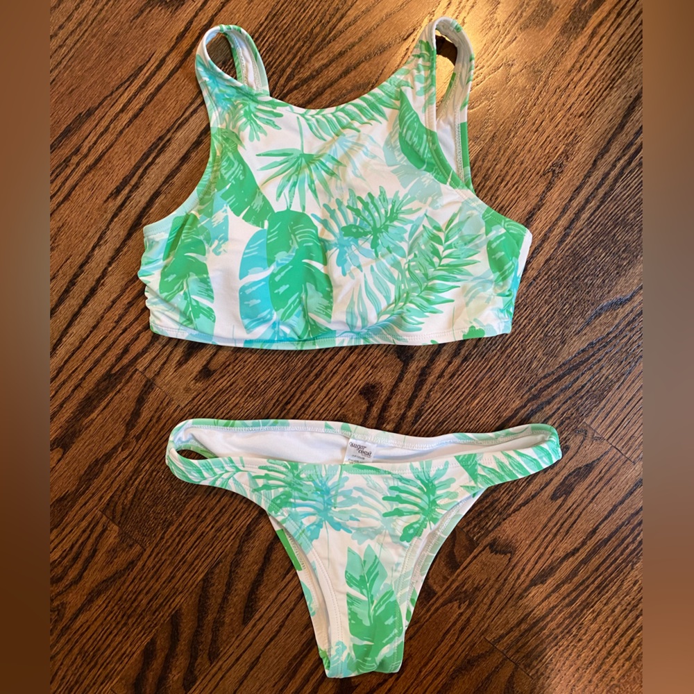 Women’s bikini top size medium and bottom small (runs all like size small)